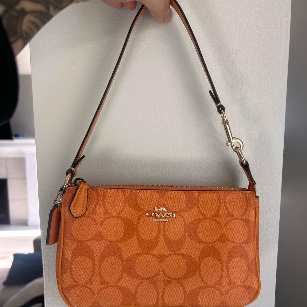 Coach orange 🍊 nolita